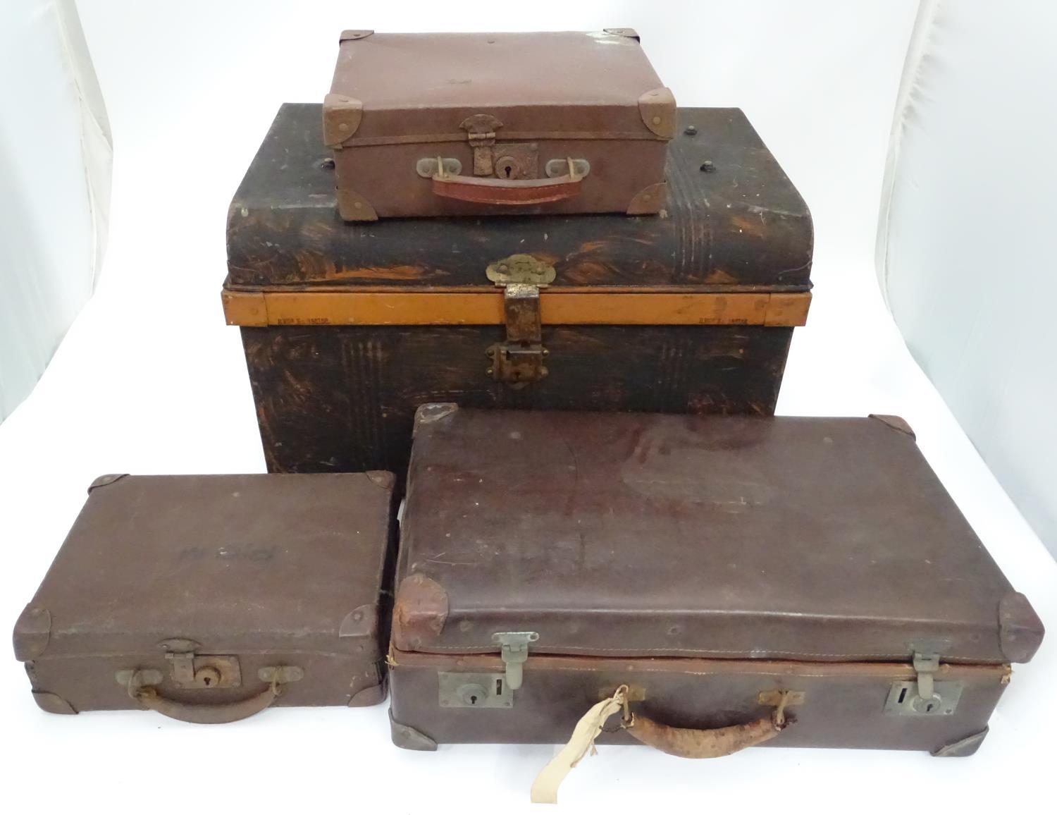 A painted tin trunk, with a suitcase and two attache cases/ The largest approx. 25" wide (4)