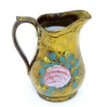 A Victorian copper lustre jug Please Note - we do not make reference to the condition of lots within