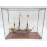 A model of HMS Victory in a perspex case Please Note - we do not make reference to the condition