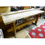 A large work bench with vice. Length approx. 78" Please Note - we do not make reference to the