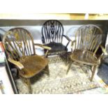 Three 20thC wheelback carver chairs (3) Please Note - we do not make reference to the condition of