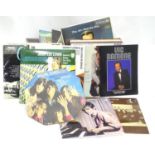 A quantity of vinyl records to include Rolling Stones, Canonball Adderley, Jerry Lee Lewis, Dean