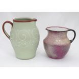 Two ceramic jugs, a large Denby stoneware jug, together with a Bisto jug with speckled detail. The