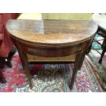 A Georgian mahogany circular fold over card table. Approx. 36" wide Please Note - we do not make