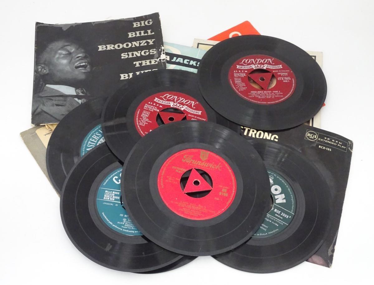 A small collection of singles and EPs by Billy Holiday, Louis Armstrong, etc. Please Note - we do