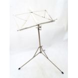Music stand. Approx. 42" extended Please Note - we do not make reference to the condition of lots