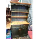 A 20thC pine narrow dresser. Approx. 73" tall Please Note - we do not make reference to the