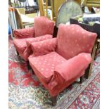 A pair of armchairs the red upholstery with fleur de lys decoration. Each approx. 34" tall (2)