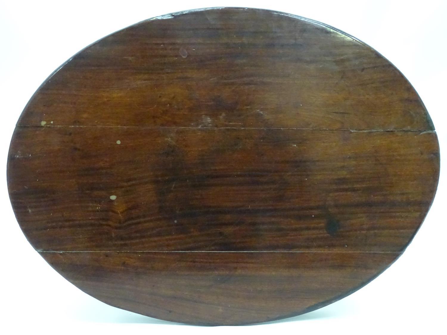 A 19thC mahogany oval occasional table. Approx. 27" tall Please Note - we do not make reference to - Image 7 of 7