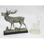 A glass ornament formed as a stag, together with a another model of a stag (2) Please Note - we do