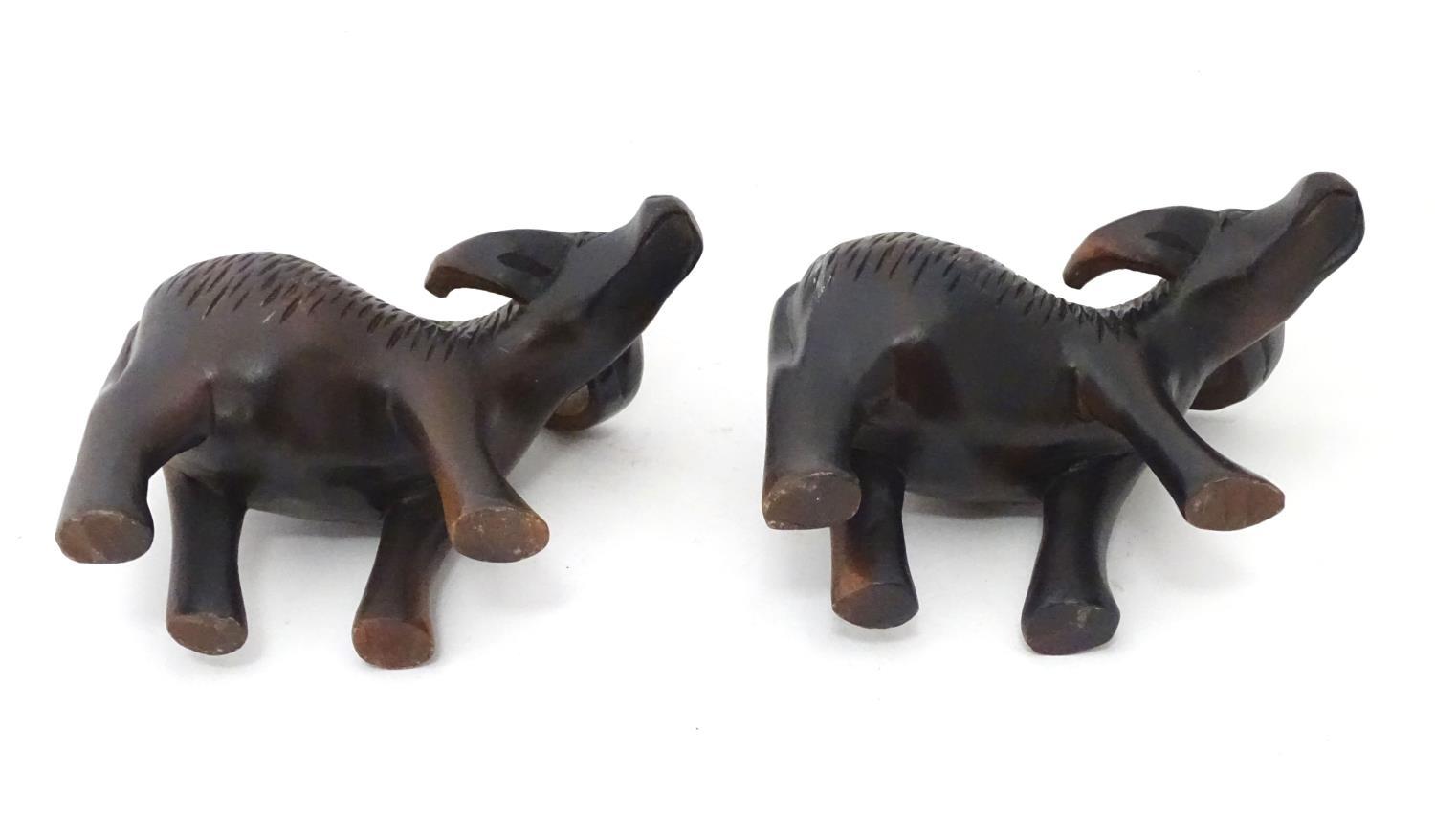 A pair of carved wooden buffalo / ox Please Note - we do not make reference to the condition of lots - Image 2 of 4