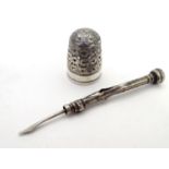 A silver white metal thimble, maker Charles Horner, together with a toothpick (2) PPlease Note -