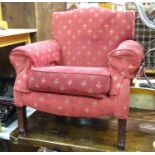 An upholstered arm chair the red upholstery with fleur de lys decoration. Approx. 35" tall Please
