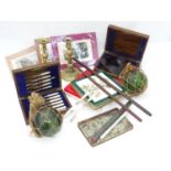 A box of miscellaneous to include two officer's swagger sticks, decorative green glass fishing /