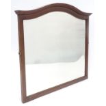 A mirror with a wooden surround Please Note - we do not make reference to the condition of lots