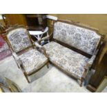 A French two seater salon sofa, together with a matching armchair, both with tapestry seats. Sofa