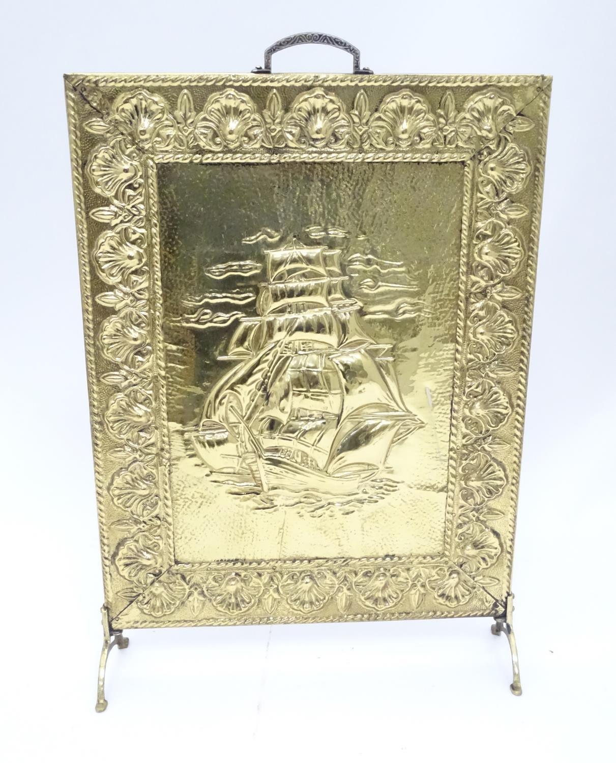 A brass fire guard with ship decoration. Approx. 26 1/2" tall Please Note - we do not make reference - Image 3 of 5