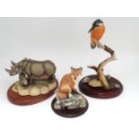 Three resin wildlife figurines ( Fox, Kingfiher & Rhino ) Please Note - we do not make reference