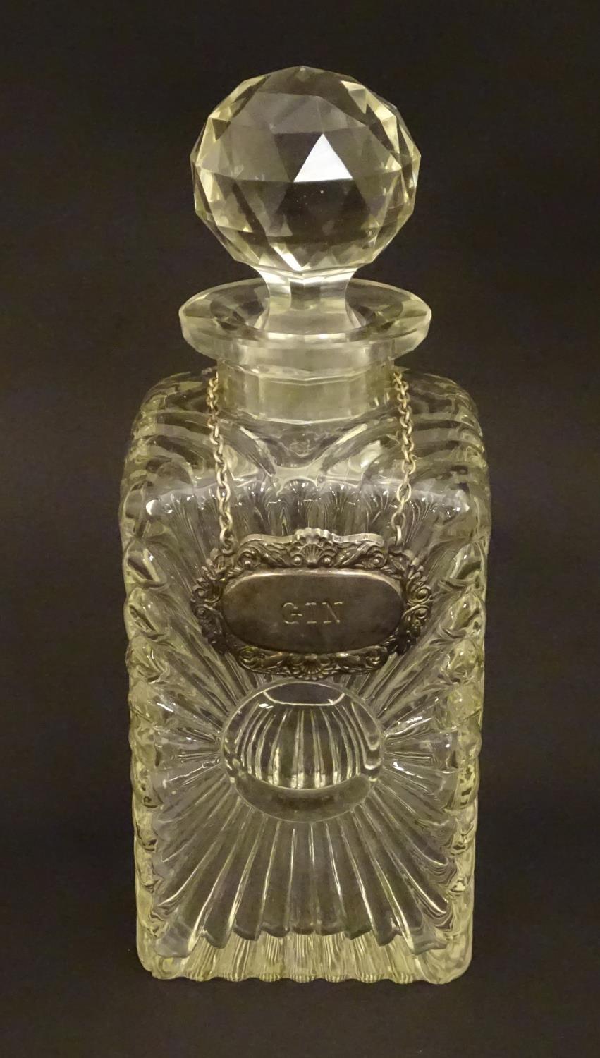 An early 20thC glass decanter of squared form. Together with a silver plate wine label / bottle - Image 2 of 7