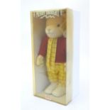 Toy: A Merrythought Limited Edition Rupert the Bear teddy with blonde mohair, black gloss eyes,