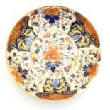 A 19thC Derby dish with hand painted floral and foliate detail in the Imari palette. Marked under.