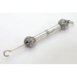 A Victorian silver glove / button hook of telescopic form. Hallmarked Birmingham 1893 maker G E