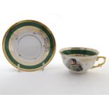 A French tea cup and saucer depicting Emperor Napoleon with green and gilt highlights. Porcelaine de