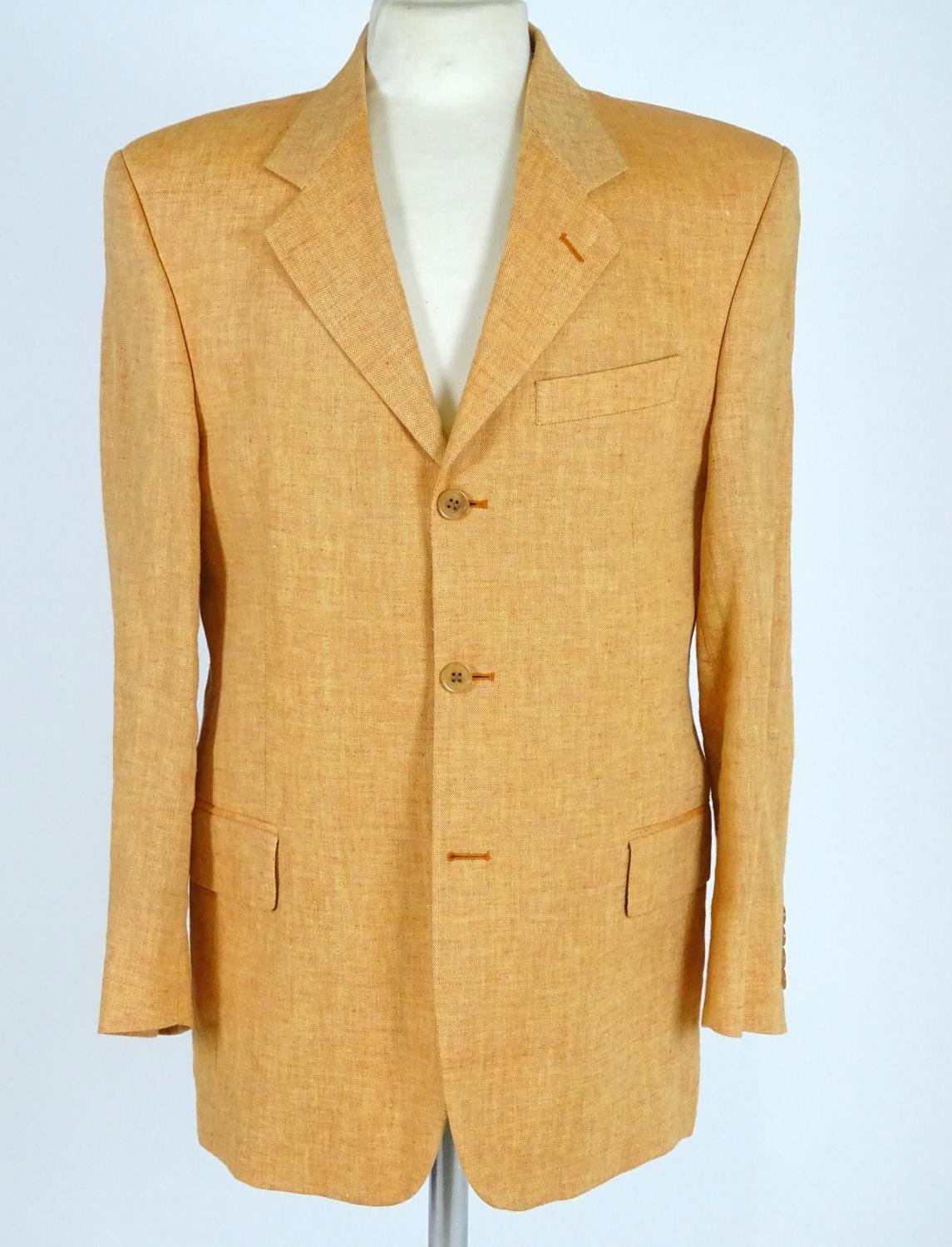 Vintage clothing/ fashion: A vintage linen jacket by Daniel Hechter, in a peach/ orange colour.