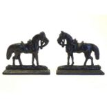 Two Victorian cast fireplace / chimney adornments modelled as horses with saddles and reins. Approx.