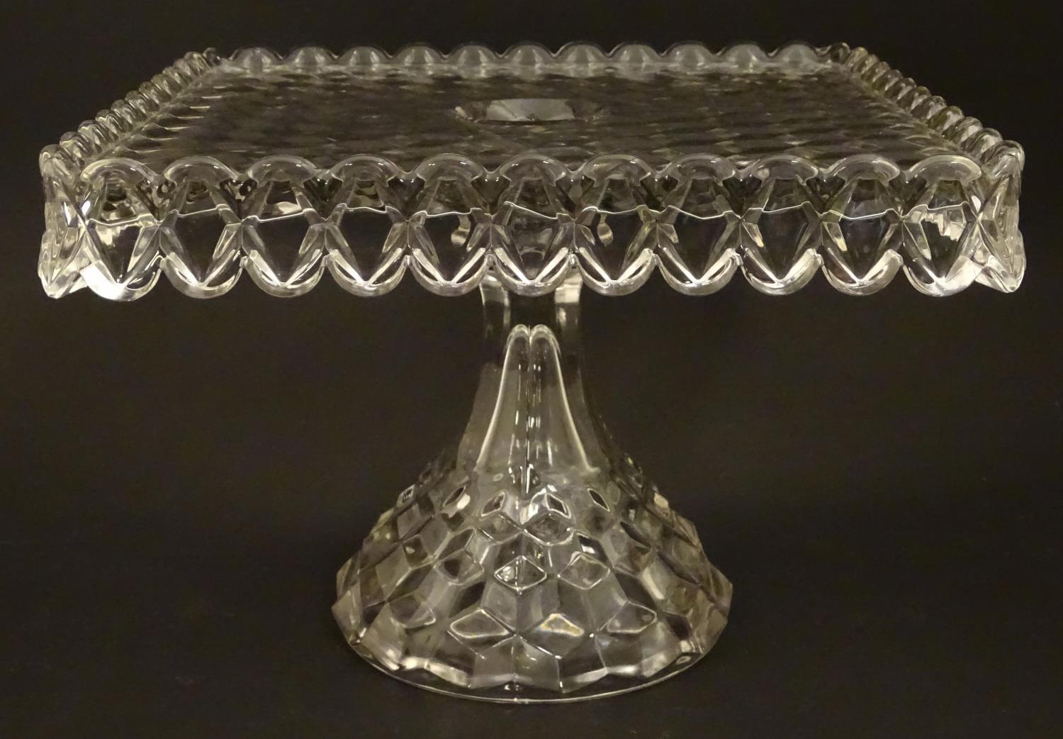 A vintage American Fostoria cube glass tazza / cake stand with squared top. 7 1/4"high x 10" high - Image 3 of 6