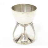 A late 20thC silver Art Nouveau style egg cup. Import marks and Retailed by CME Jewellery Ltd. 2 1/