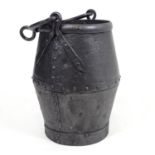 A galvanised steel well bucket with riveted banding and a wrought iron swing handle. Approx. 15 1/4"