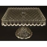 A vintage American Fostoria cube glass tazza / cake stand with squared top. 7 1/4"high x 10" high