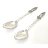 Royal memorabilia : A pair of silver souvenir / commemorative teaspoons, the handles surmounted by