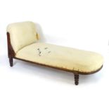 An Edwardian chase longue for re-upholstery. 68" long x 26" wide x 32" high. Please Note - we do not