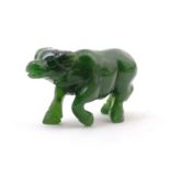 An Oriental hardstone carving modelled as a stylised buffalo. Approx. 2" long Please Note - we do