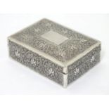 A white metal table top cigarette box with foliate decoration and wood lined interior maker K.S.W. 3