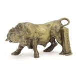 An early 20thC brass model of a charging bull, with a post engraved From Harry Granger, Hitherto,