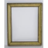 A gilt running pattern frame. Approx. 29 1/2" x 19 1/2" Please Note - we do not make reference to