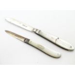 Two folding fruit knives with mother of pearl handles and silver blades, one hallmarked Sheffield