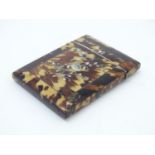 A 19thC tortoiseshell lined card case with floral and foliate abalone inlay. Approx. 4 1/4" x 3"