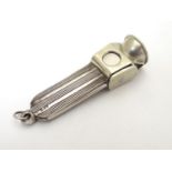 A white metal cigar/ cheroot cutter marked ' Silver ' 2 1/4" long Please Note - we do not make