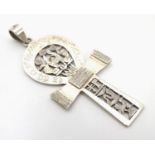A Continental silver pendant formed as a coptic cross, possibly Egyptian. Approx. 2" high Please