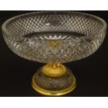 An early 20thC cut crystal comport with ormolu and gilt metal mounts with putti detail 6" high x