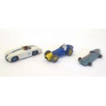 Toys: Three assorted Dinky Toys die cast scale model cars comprising Cunningham C-5R, no. 133;