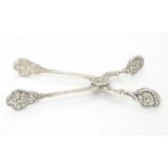 Swedish white metal sprung scissor action sugar tongs with floral decoration. Marked SWEDEN ALP.