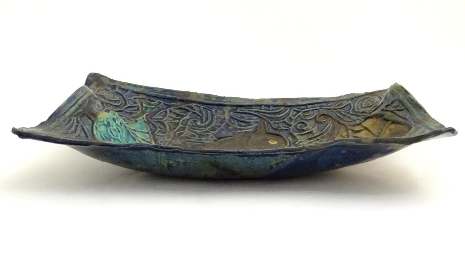 A Scandinavian studio pottery shaped dish with relief decoration depicting three birds. Indistinct - Image 6 of 8