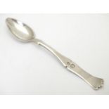 A Turkish silver spoon with shaped handle. 6 3/4" long Please Note - we do not make reference to the