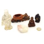 Asian items to include a carved hardstone Buddha, a carved soapstone figure / scholar wearing robes,