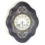 A late 19thC / early 20thC French Vineyard clock, the central dial with Enamel Roman numerals, the